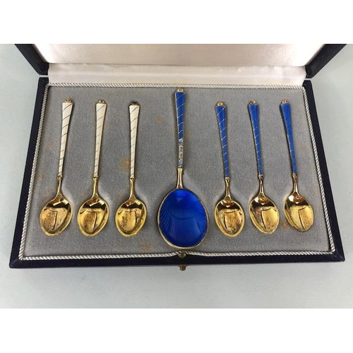 64 - Boxed set of Silver enamel and Gold Gilt spoons each marked ELA Denmark STERLING 925 S (enamel lose ... 