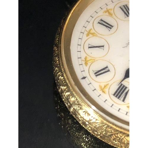 1 - 18k Gold pocket watch with white enamel dial with roman numerals framed in gold and a floral spray d... 