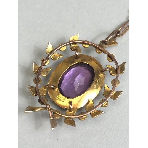 12 - Antique Jewellery, 19th century 9ct gold pendant of a central oval Amethyst surrounded by seed pearl... 