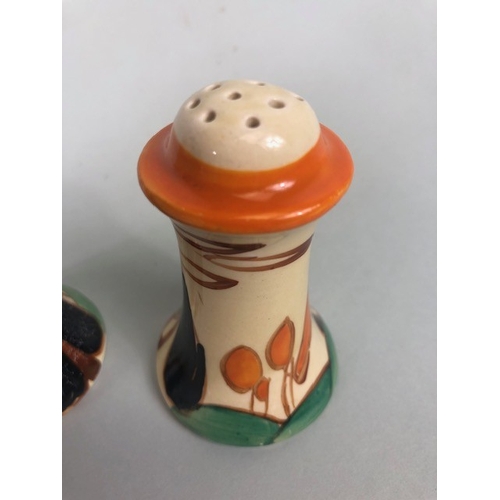 121 - Clarice Cliff, Art Deco interest, group of ceramics to include a pair of GAYDAY squat candle holders... 