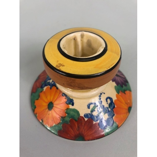 121 - Clarice Cliff, Art Deco interest, group of ceramics to include a pair of GAYDAY squat candle holders... 