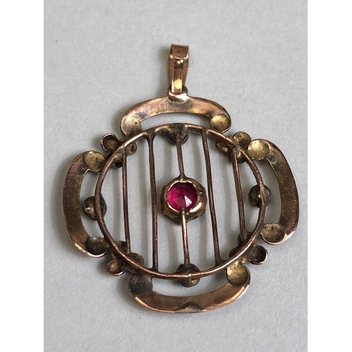 14 - Two Rose Gold Antique pendants, one set with seed pearls, the other with a a single Garnet