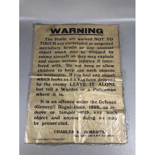 143 - Militaria Interest, WW2 ARP poster issued in 1939 warning of the dangers relating to unexploded Ince... 