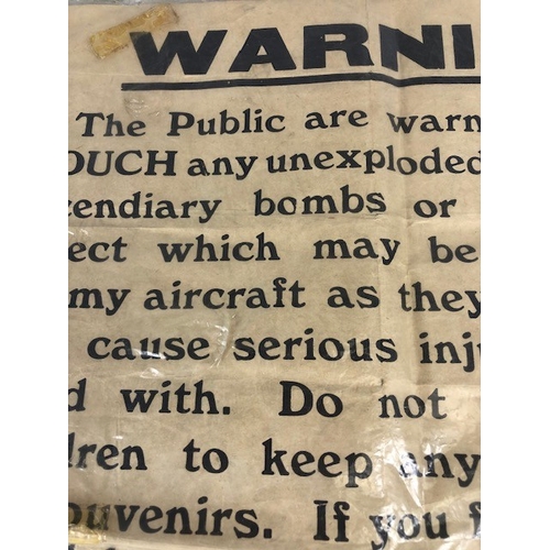 143 - Militaria Interest, WW2 ARP poster issued in 1939 warning of the dangers relating to unexploded Ince... 