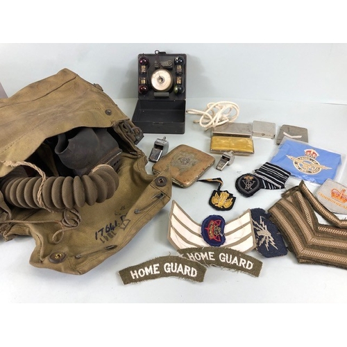 145 - Military interest collection of WW1 and WW2 items to include British and commonwealth cap badges col... 