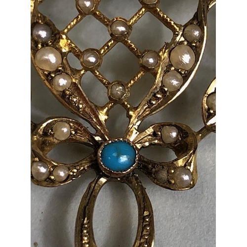 16 - Antique 9ct Gold lattice work pendant set with seed pearls and cabochon cut Turquoise stones, on a 9... 