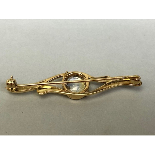 16A - 18ct Gold Brooch set with a faceted Pale yellow Topaz approx 5cm in length and total weight approx 6... 