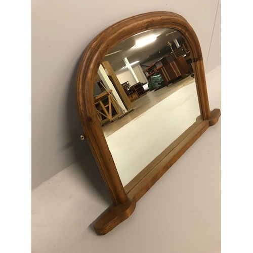 173 - Modern pine framed half moon overmantel mirror approximately 74 x 110cm