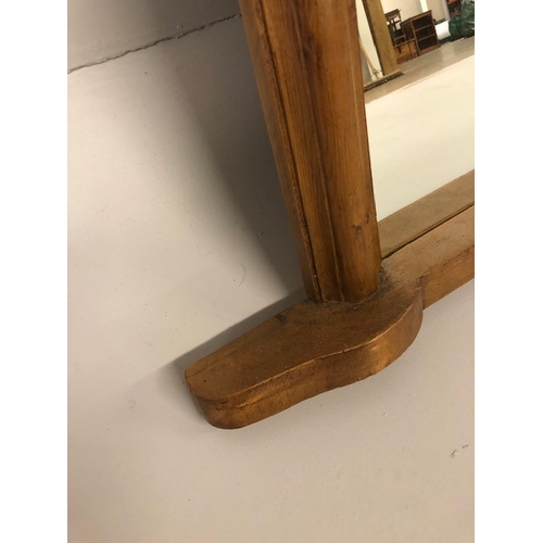 173 - Modern pine framed half moon overmantel mirror approximately 74 x 110cm