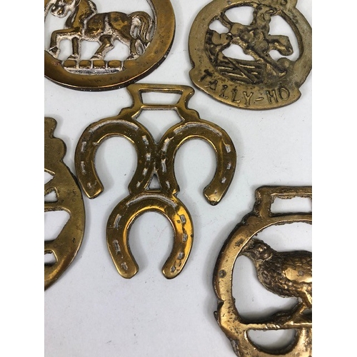 196 - Collection of Antique and vintage horse brasses to include Clock face, Ulster hand, Queens crown, ta... 