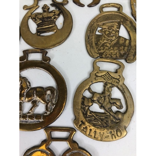 196 - Collection of Antique and vintage horse brasses to include Clock face, Ulster hand, Queens crown, ta... 