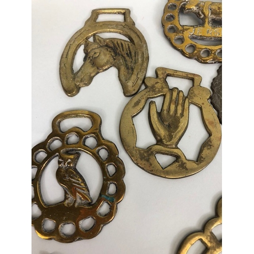 196 - Collection of Antique and vintage horse brasses to include Clock face, Ulster hand, Queens crown, ta... 