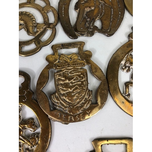 196 - Collection of Antique and vintage horse brasses to include Clock face, Ulster hand, Queens crown, ta... 