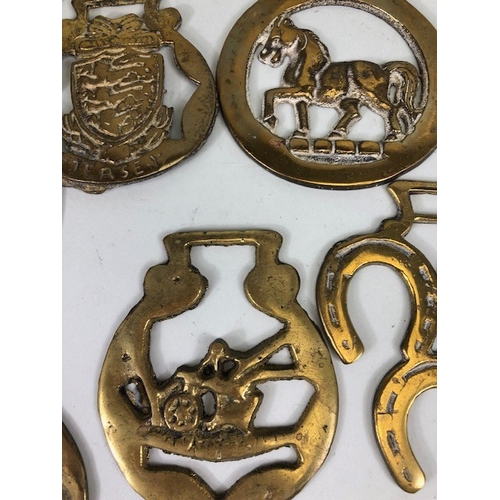 196 - Collection of Antique and vintage horse brasses to include Clock face, Ulster hand, Queens crown, ta... 