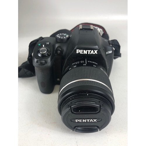 197 - Photography interest, Pentax K50 digital camera with 18-55mm lens in soft case, not tested