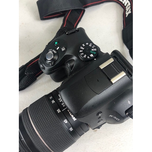 197 - Photography interest, Pentax K50 digital camera with 18-55mm lens in soft case, not tested