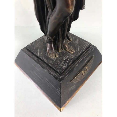 205 - Art Deco style patinated bronze figure of an Egyptian woman, stood on a stepped plinth with two head... 