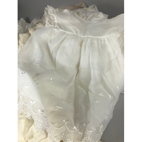 209 - Vintage and Antique children's clothing and lace to include Christening gowns, embroidered tops shaw... 