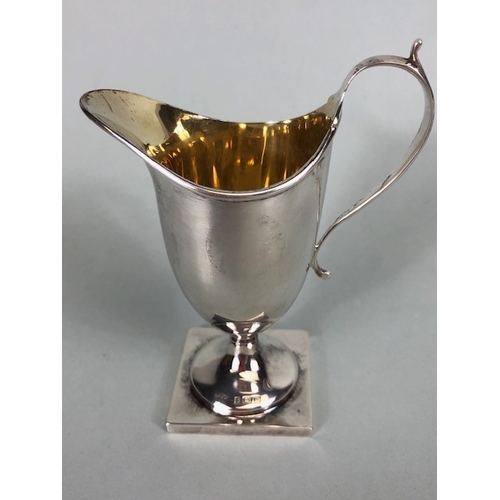 21 - Antique Silver, George III pattern hallmarked pedestal bottom cream jug approximately 47.89g along w... 