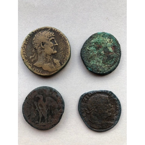 210 - Antiquities, four ancient bronze coins from the Roman Empire the larger marked S C to reverse