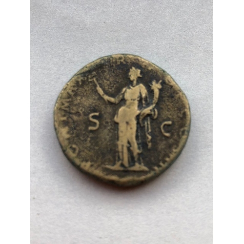 210 - Antiquities, four ancient bronze coins from the Roman Empire the larger marked S C to reverse