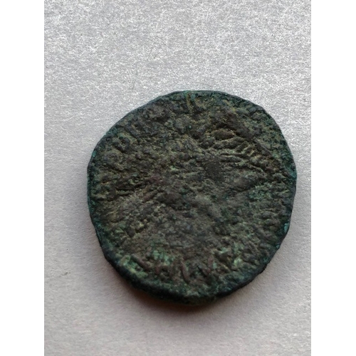 210 - Antiquities, four ancient bronze coins from the Roman Empire the larger marked S C to reverse