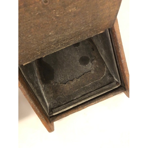 217 - Antique coal scuttles one box shaped of light oak with brass fittings, the other cast iron in a shel... 