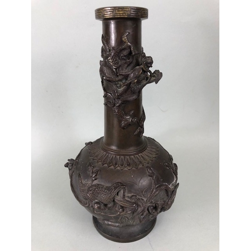 221 - Japanese 19th century (late Edo) bronze vase, decorated in high relief with coiled dragon around nec... 