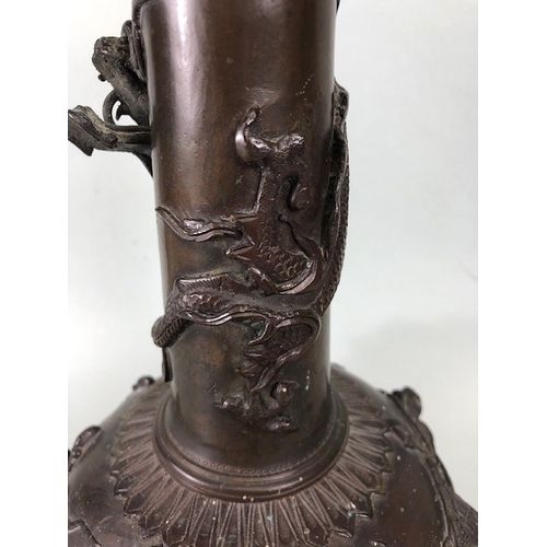 221 - Japanese 19th century (late Edo) bronze vase, decorated in high relief with coiled dragon around nec... 