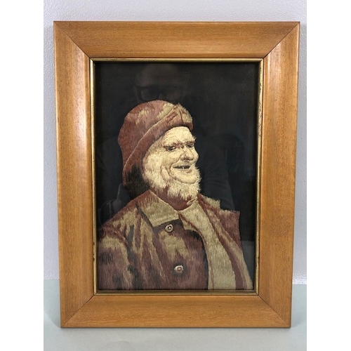 234 - Antique 19th century embroidered portrait of characterful fisherman, remounted in a modern frame, ap... 