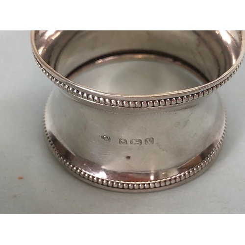 26 - Antique silver, collection of silver hall marked napkin rings,approximately 133g, 2 unmarked pin tra... 