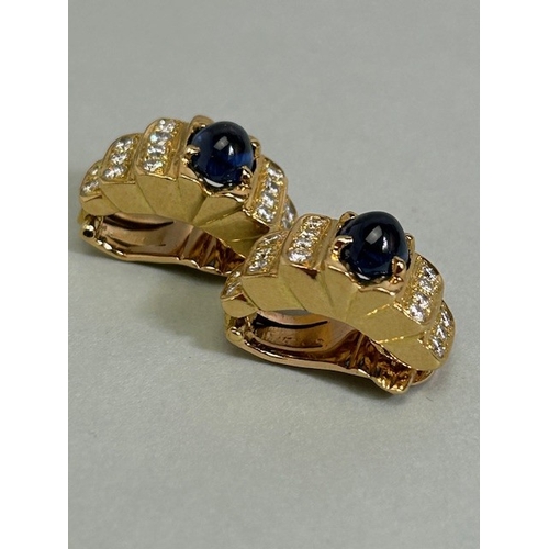 28A - Pair of 18ct Gold Art Deco style clip on earrings set with Cabochon cut Sapphires and each with five... 