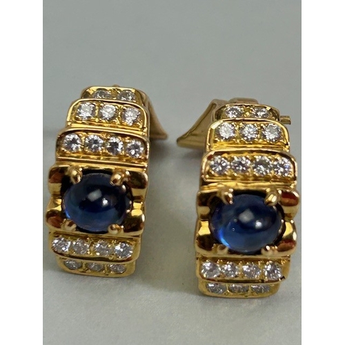 28A - Pair of 18ct Gold Art Deco style clip on earrings set with Cabochon cut Sapphires and each with five... 