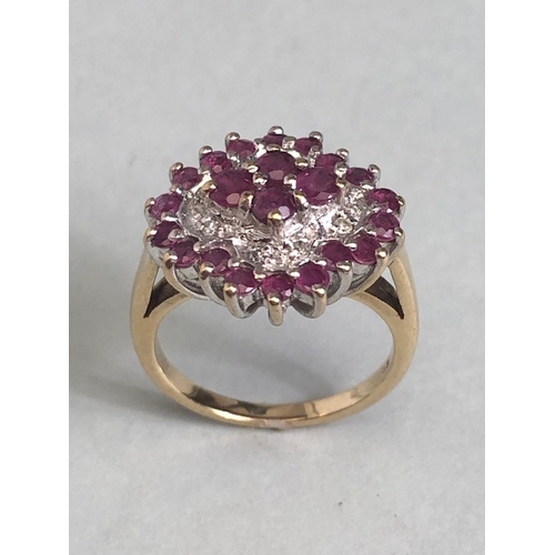 38 - 9ct gold quatrefoil cluster ring set with rubies and diamonds, in a white gold setting, approximatel... 