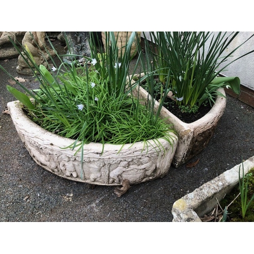 411 - Semi circular garden planters made up of two quarter pots (2)