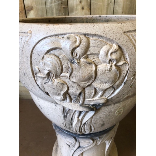 414 - Pair of Art Nouveau large garden planters on stands with raised decoration, each approx 76cm tall