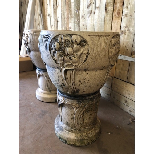 414 - Pair of Art Nouveau large garden planters on stands with raised decoration, each approx 76cm tall