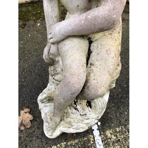 425 - Garden statue of a naked girl sat on a shell