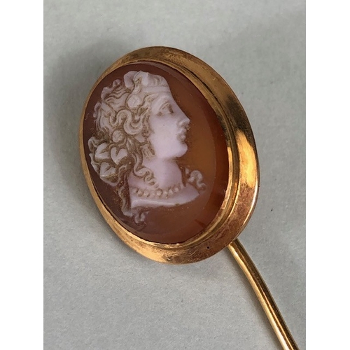 48 - Antique jewellery, 19th century rose metal mounted cameo stick pin, approximately 3.28g