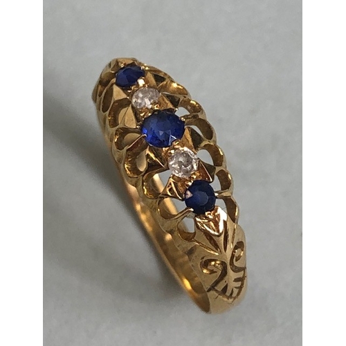 50 - Antique jewellery, 18ct yellow gold open work ring set with two sapphires and two diamonds, approxim... 