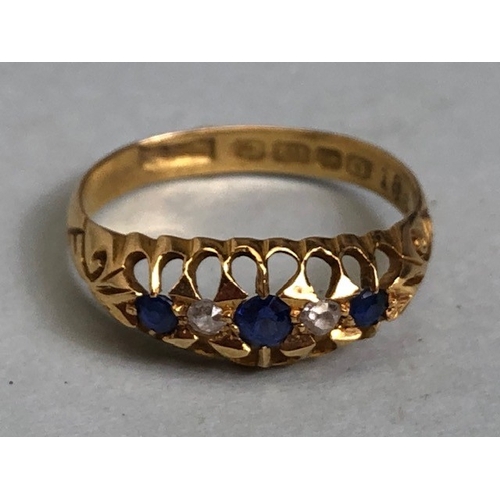 50 - Antique jewellery, 18ct yellow gold open work ring set with two sapphires and two diamonds, approxim... 