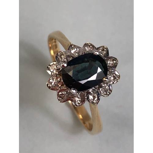 52 - Antique and Vintage jewellery, 9ct gold hallmarked cluster ring set with central dark sapphire surro... 