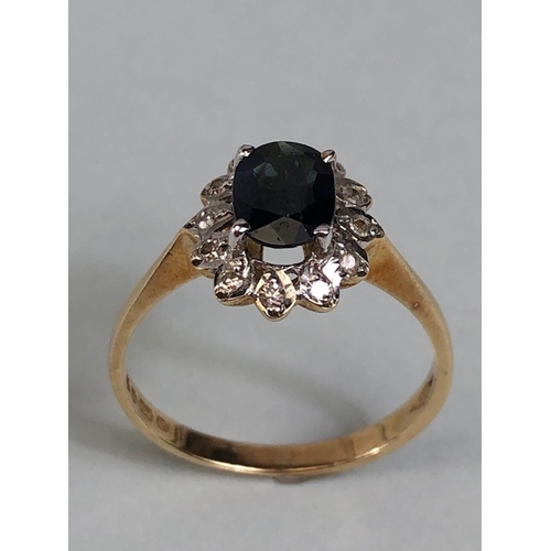 52 - Antique and Vintage jewellery, 9ct gold hallmarked cluster ring set with central dark sapphire surro... 