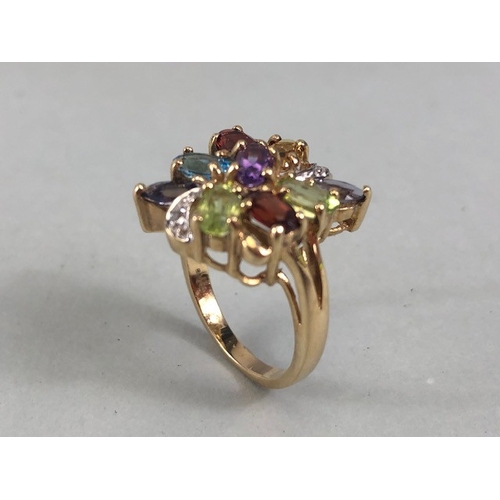 53 - Cocktail cluster ring of multi colour stones, the shank marked 9k and 375 approximately size J and 3... 