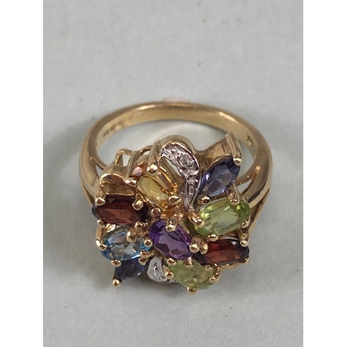 53 - Cocktail cluster ring of multi colour stones, the shank marked 9k and 375 approximately size J and 3... 