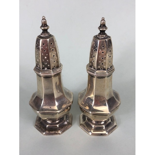 6 - Pair of silver hallmarked salt and pepper shakers hallmarked for Chester by maker Stokes & Ireland L... 