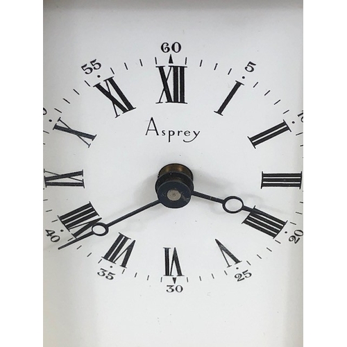 113 - Antique and Vintage Clocks,  Asprey brass framed carriage clock with white face and roman numerals, ... 