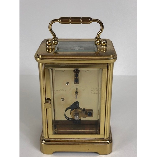 113 - Antique and Vintage Clocks,  Asprey brass framed carriage clock with white face and roman numerals, ... 