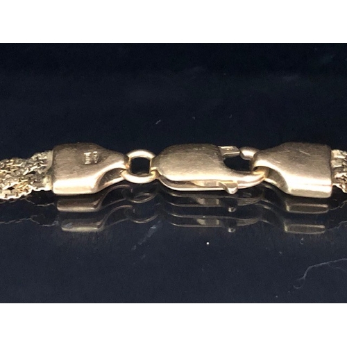 14 - 18ct Gold twist design bracelet A/F approx 19cm in length and 9.6g