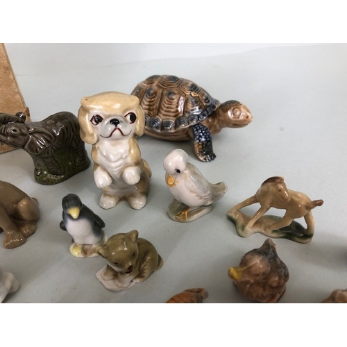 148 - Vintage Wade collection of whimsies, cartoon characters, and animals